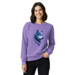 Woman wearing Comfort Colors purple sweatshirt with a wolf design on a white background