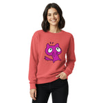 Woman wearing a red sweatshirt with a purple cartoon character on a white background