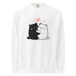 Womens white long-sleeve shirt with black and white cat design and pink hearts on a white background