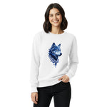 Woman wearing Comfort Colors white sweatshirt with a blue wolf design on a white background
