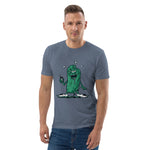 Man wearing a blue t-shirt with a pickle graphic design on a white background