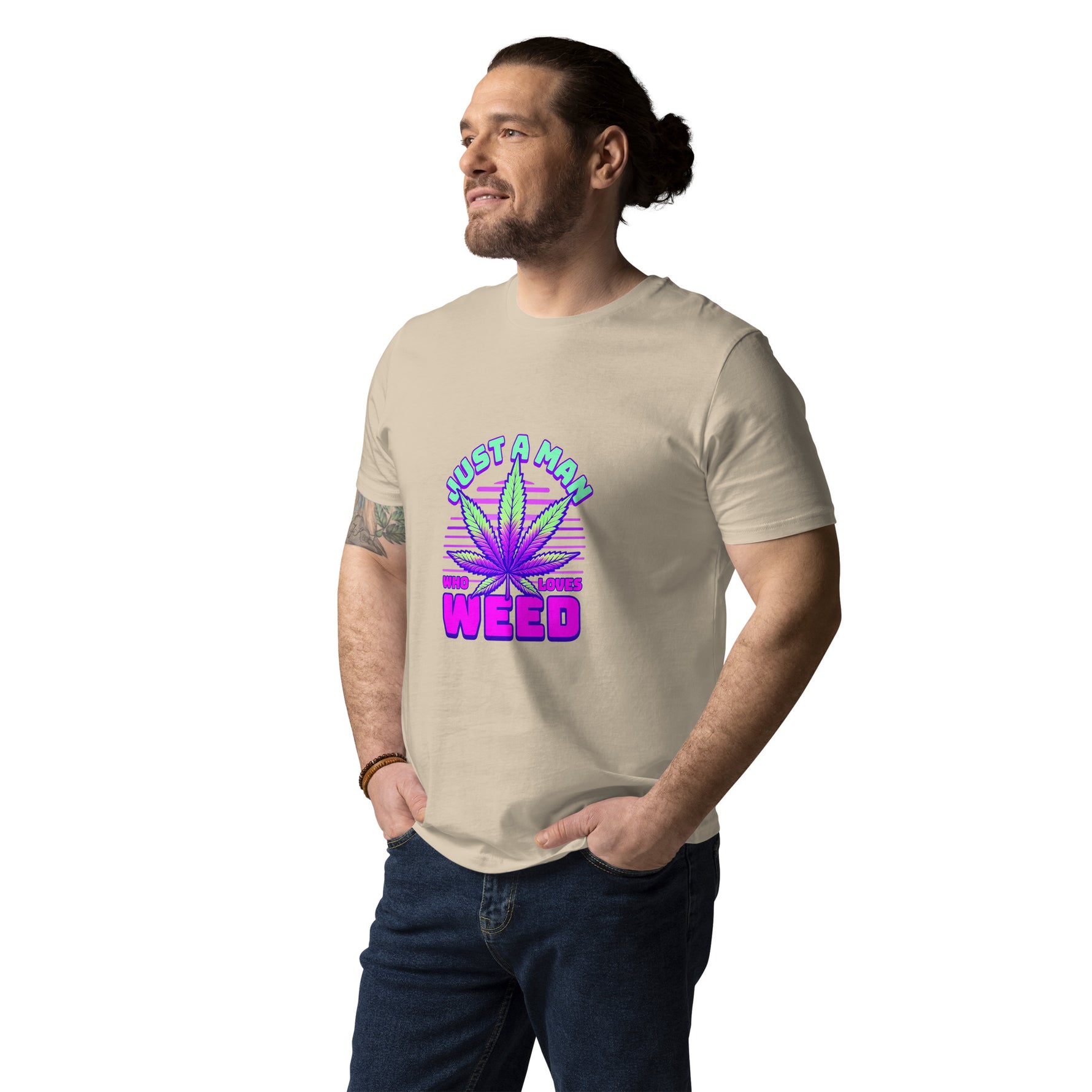 Man wearing a beige t-shirt with a colorful graphic design on a white background