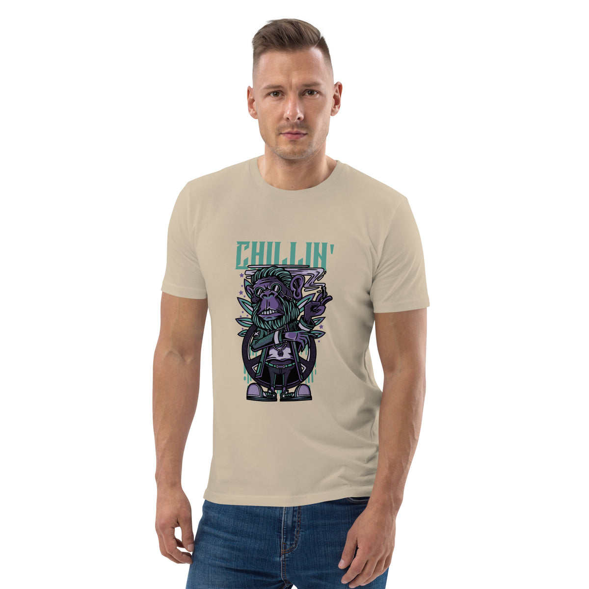 Man wearing a beige t-shirt with a graphic design and text 'Chillin'' on a white background