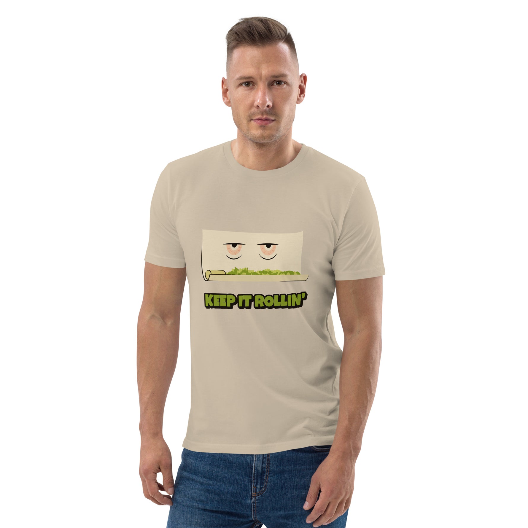 Man wearing a beige t-shirt with a graphic design and text on a white background
