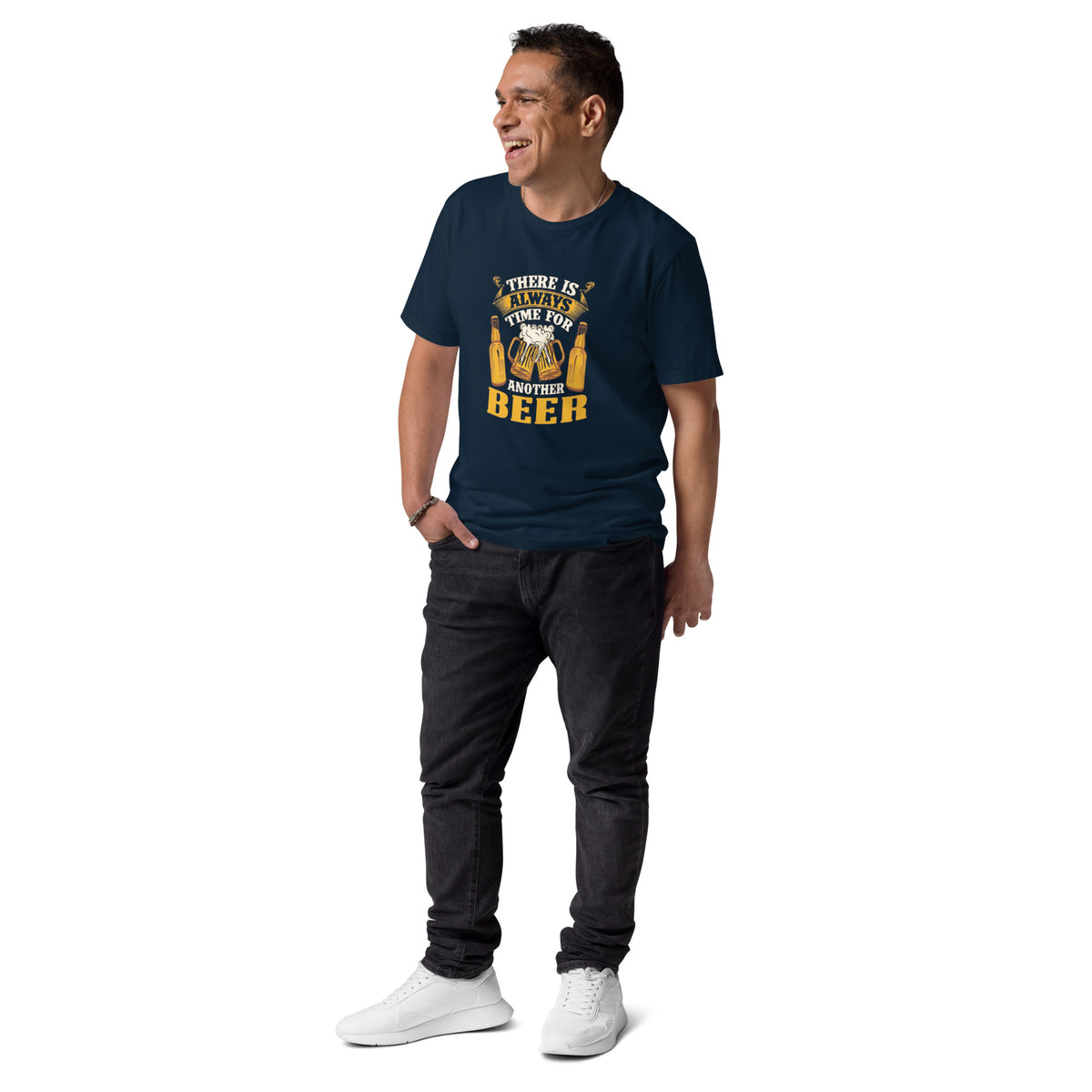 Man wearing a navy blue t-shirt with a graphic design and text, standing against a white background
