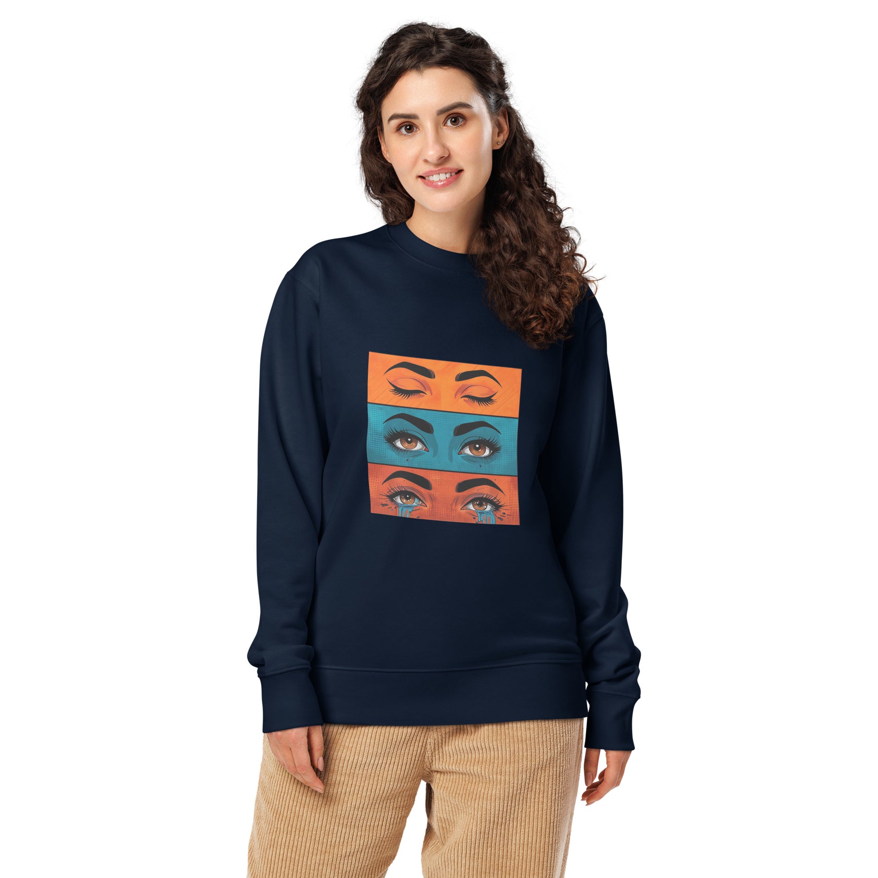 Woman wearing a navy blue sweatshirt with eye design on a white background