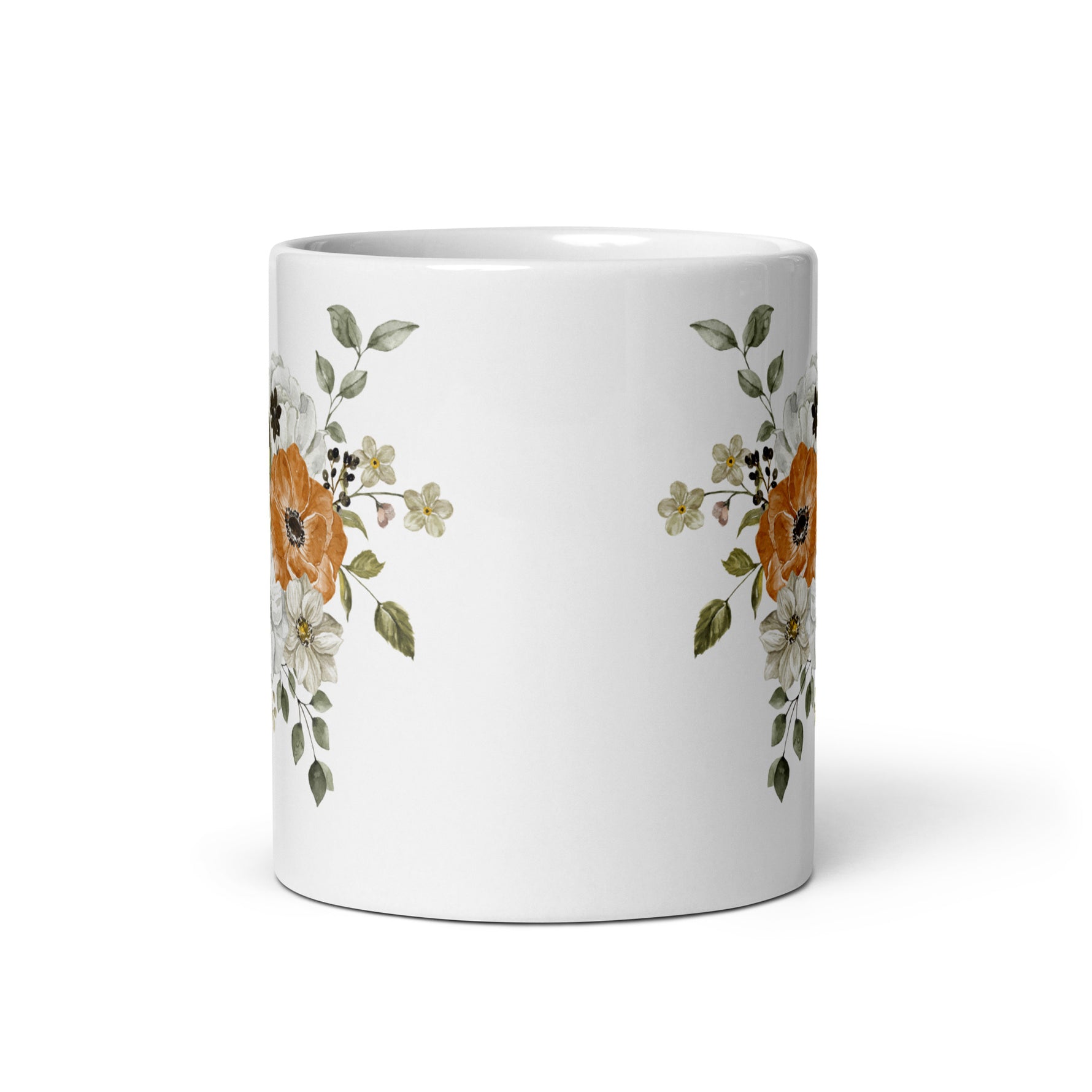 White mug with floral design on a white background