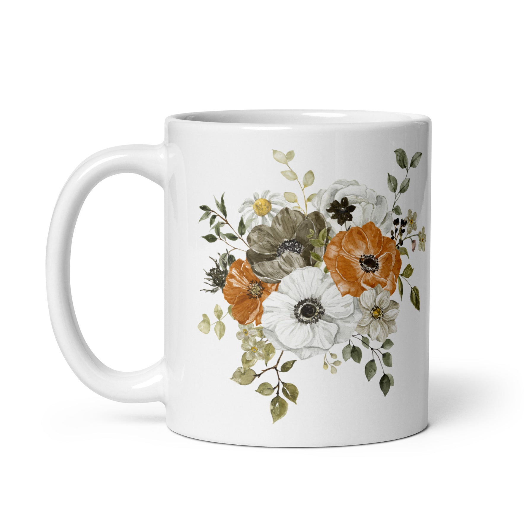 White mug with floral design on a white background