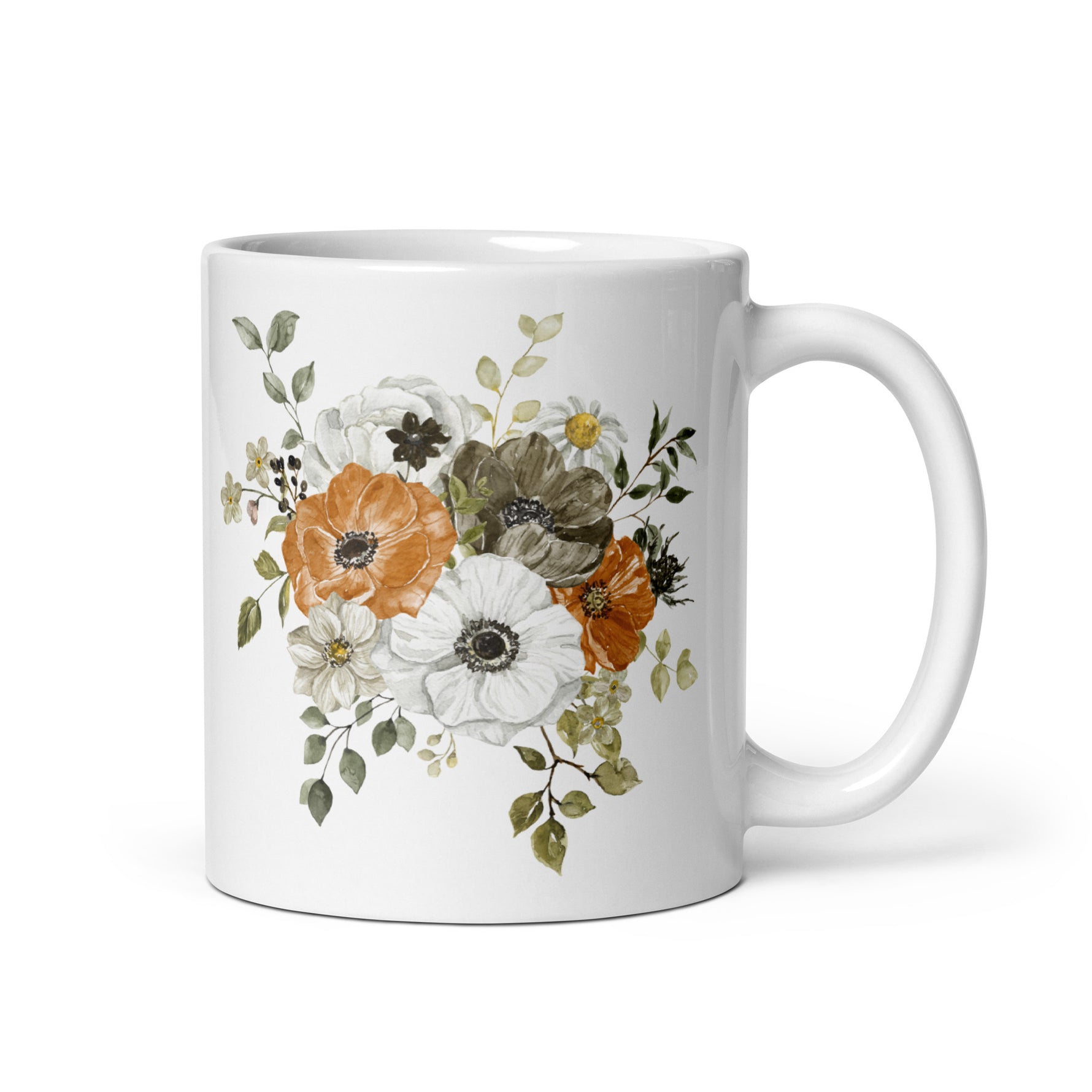 White mug with floral design on a white background
