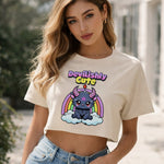 Woman wearing a white t-shirt with a cartoon character and 'Devilishly Cute' text.