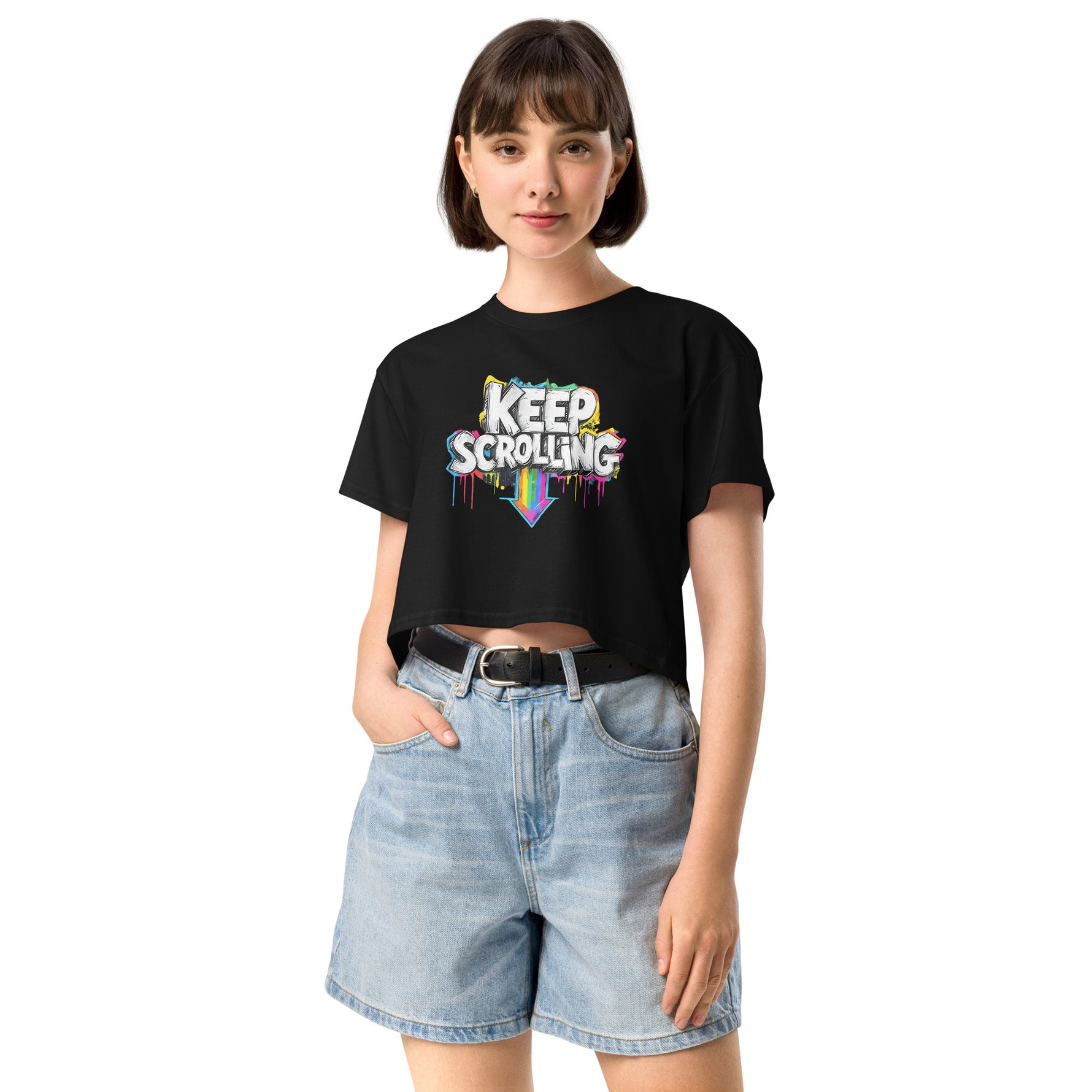 Woman wearing a black t-shirt with 'Keep Scrolling' text and denim shorts on a white background