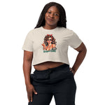 Woman wearing a beige t-shirt with a graphic design and text on a white background