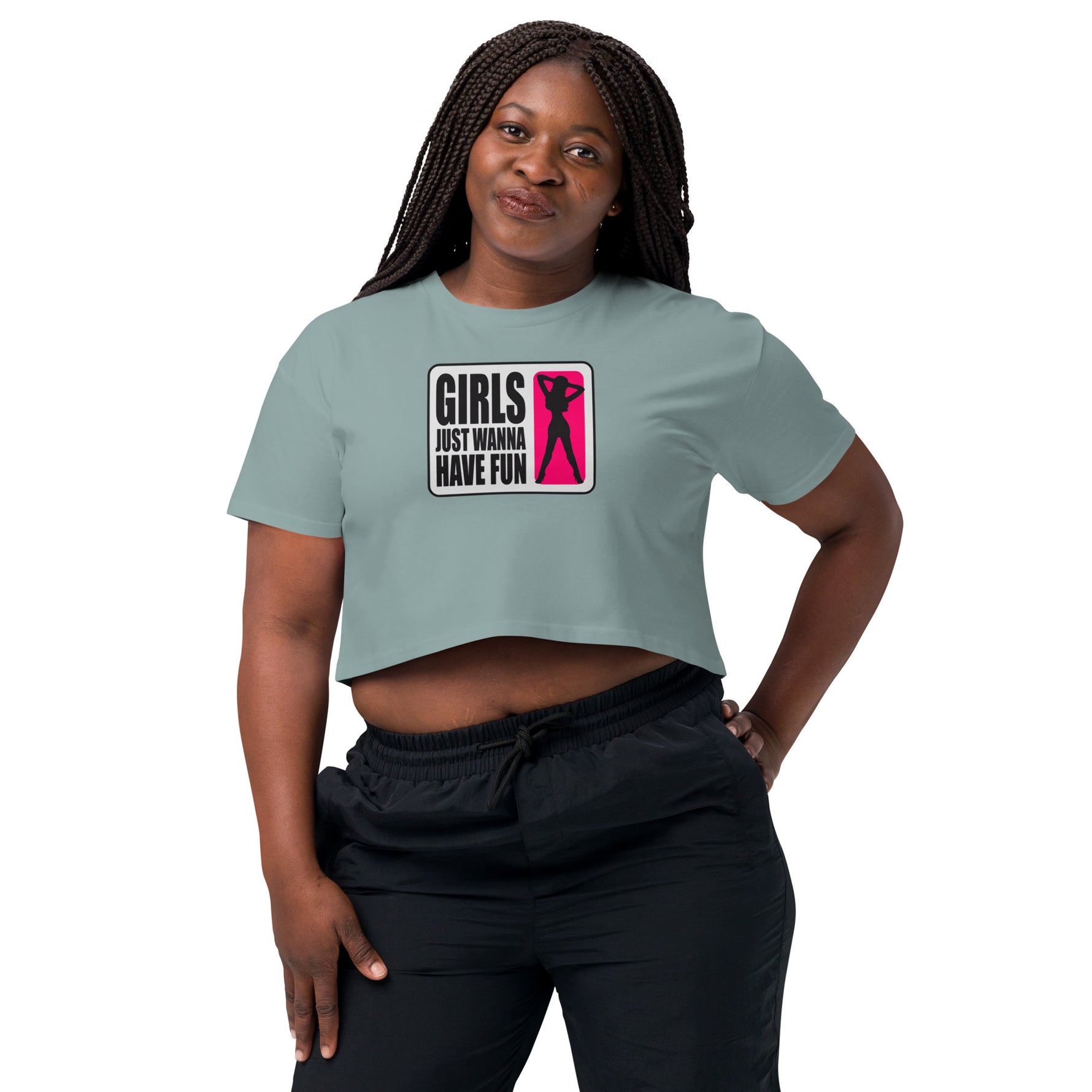 Woman wearing a light blue crop top with a graphic design and text.