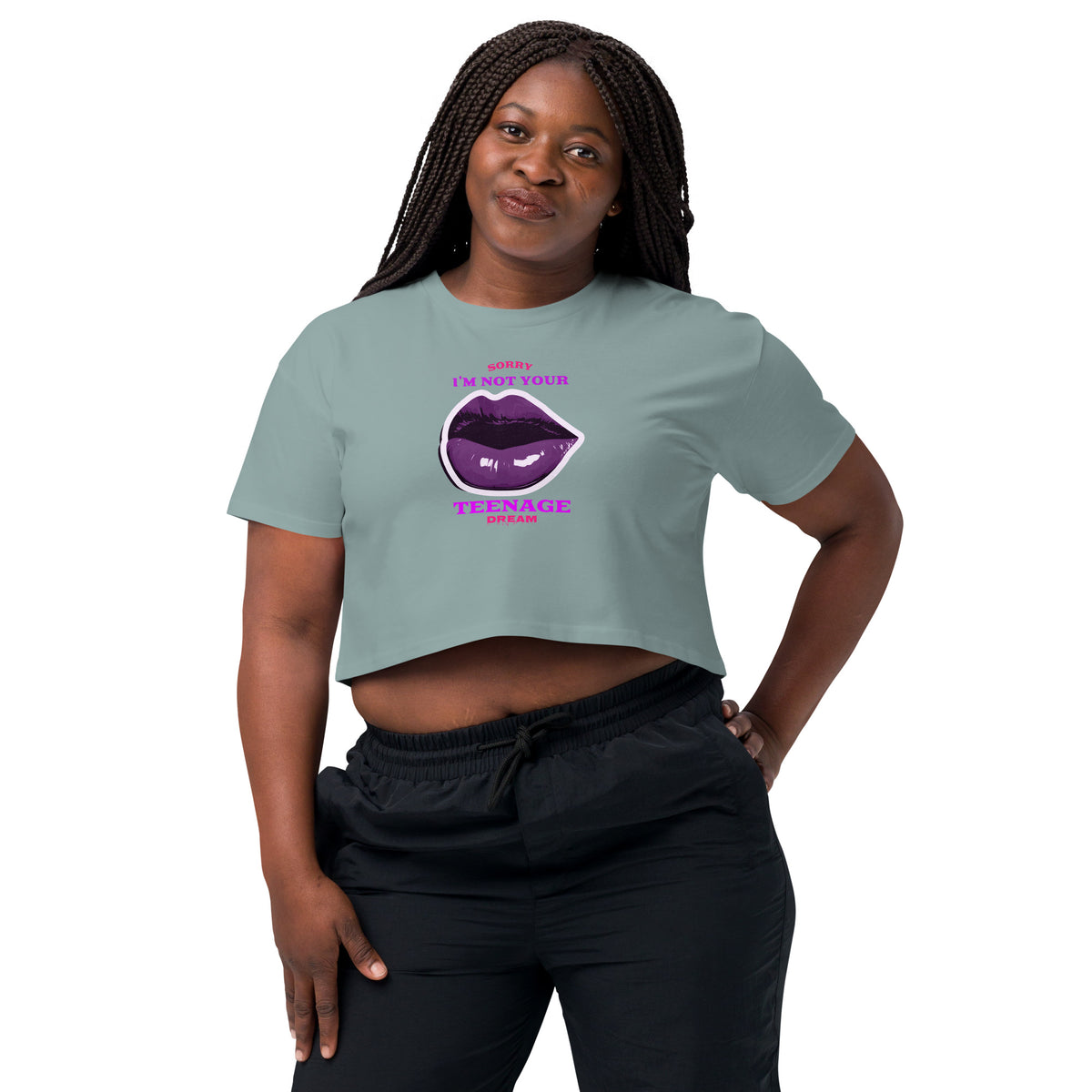 Woman wearing a crop top with a graphic design and text on a white background