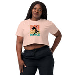 Woman wearing a beige t-shirt with 'DANCE' text and graphic on a white background