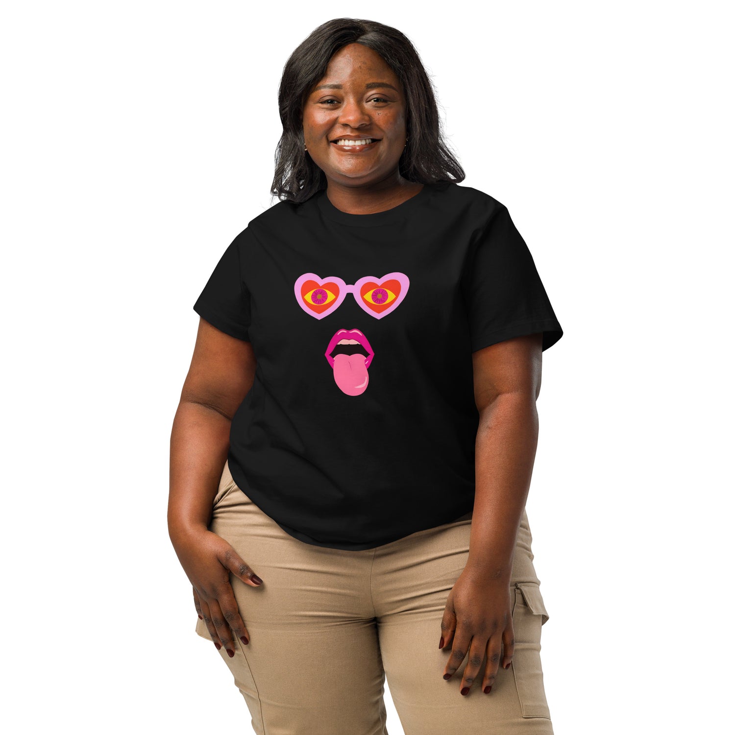 Woman wearing a black t-shirt with a colorful graphic design on a white background