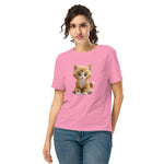 Woman wearing a pink t-shirt with a kitten graphic on a white background