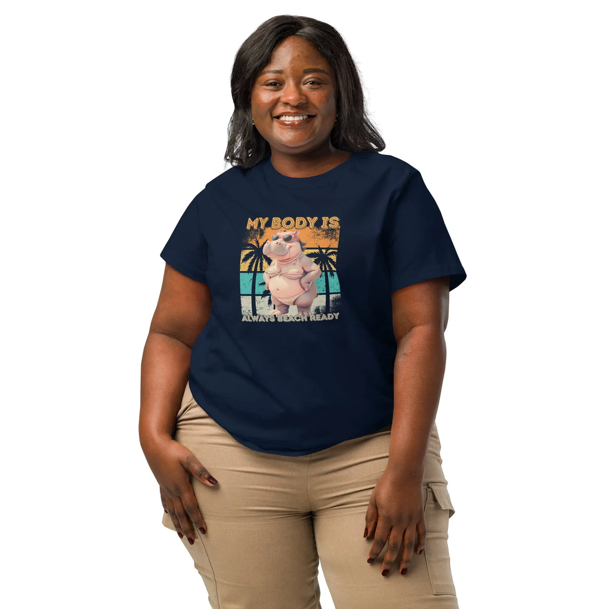 Woman wearing a navy blue t-shirt with a graphic design and text on a white background