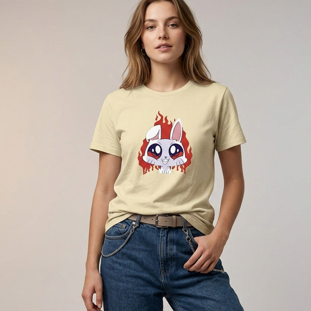 Woman wearing a beige t-shirt with a graphic design of a cartoon character on a plain background
