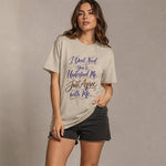 A woman modeling a beige graphic t-shirt with the text 'I Don't Need You to Understand Me, Just Agree with Me.