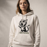woman wearing a white hoodie with a graphic of a cat and 'I Am Lovely' text on a plain background