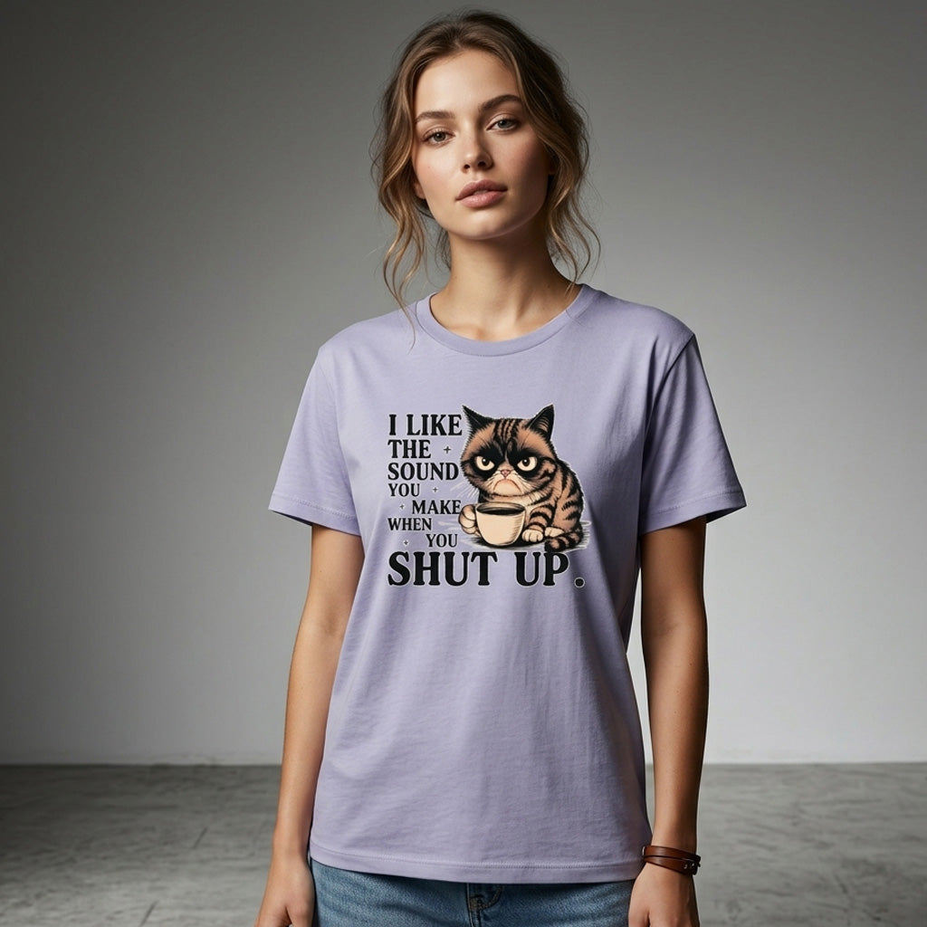 Woman wearing a purple t-shirt with a graphic of a cat and text on a gray background
