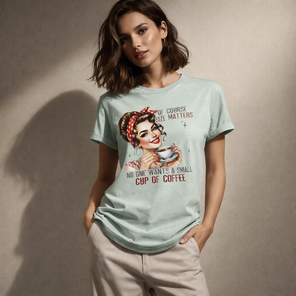 Woman wearing a light blue t-shirt with a graphic design and text against a beige background