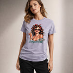 Woman wearing a t-shirt with a graphic design and text on a plain background