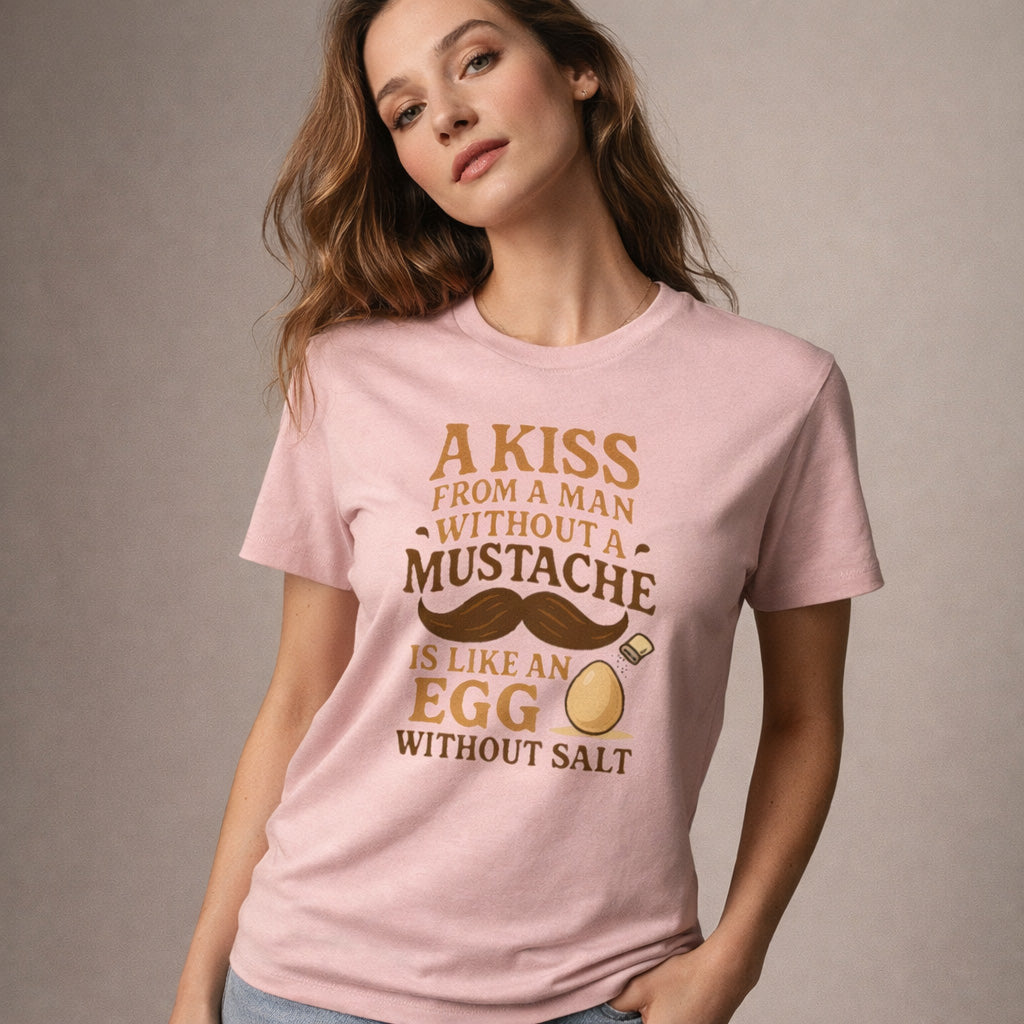 Woman wearing a pink t-shirt with humorous text design on a plain background