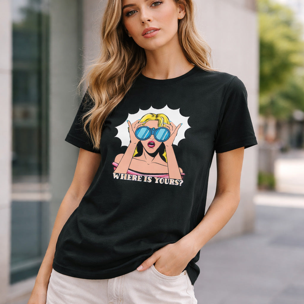 Woman wearing a black t-shirt with a graphic design outdoors