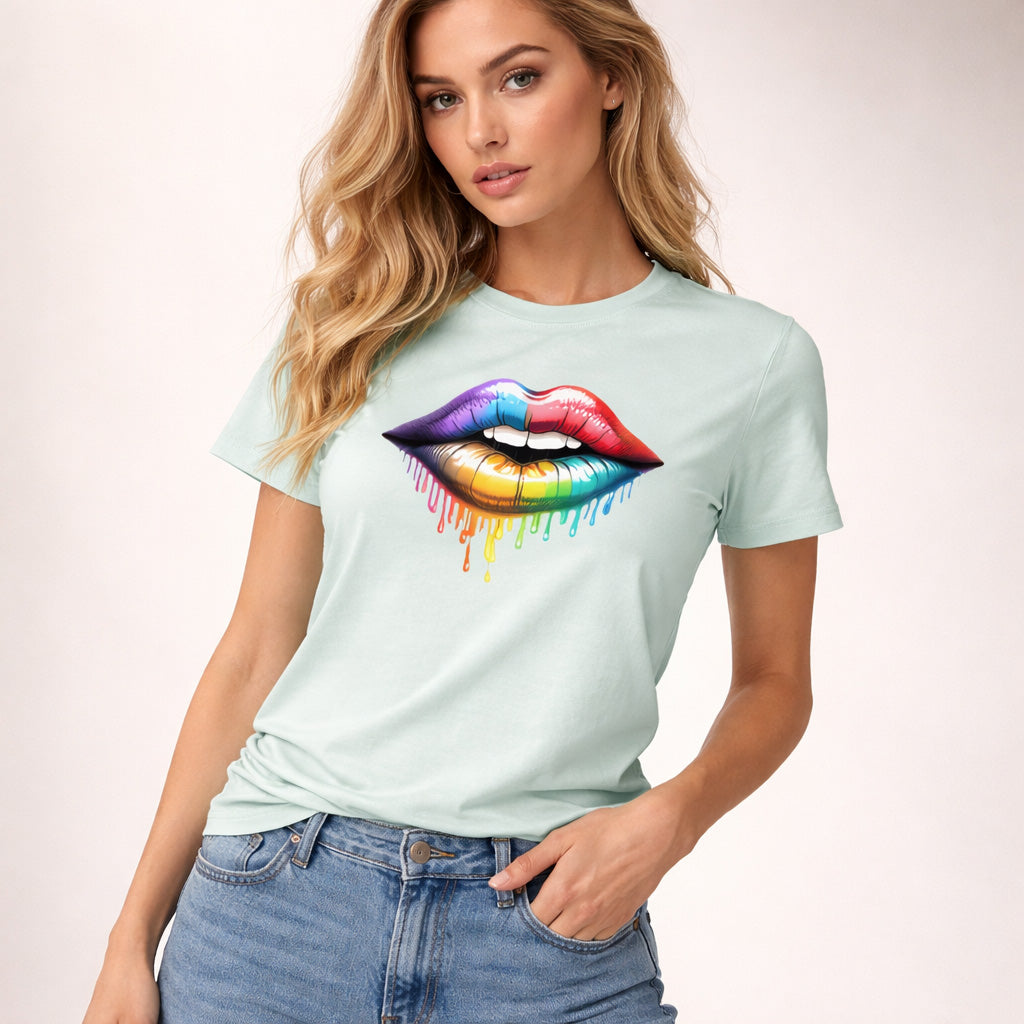Woman wearing a light blue t-shirt with a colorful lip design on a plain background