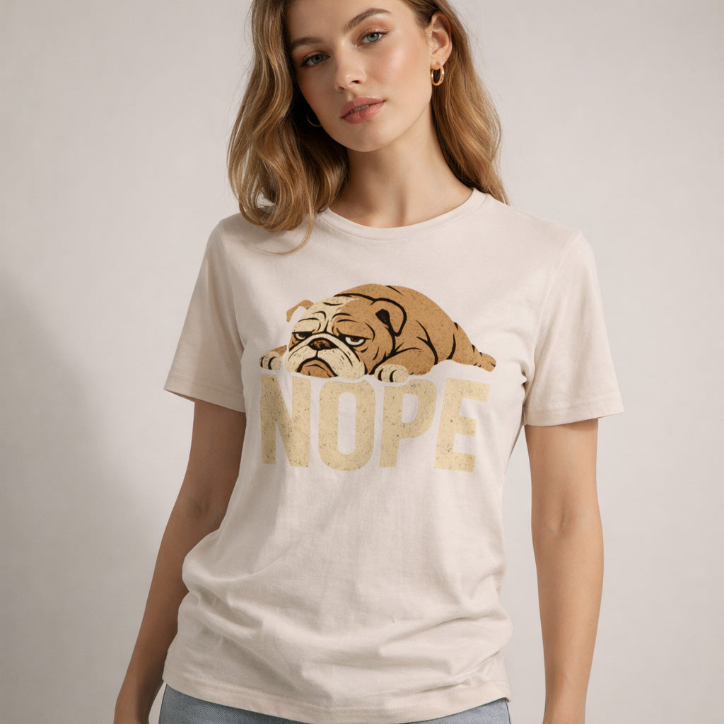 Woman wearing a t-shirt with a bulldog graphic and 'NOPE' text on a plain background